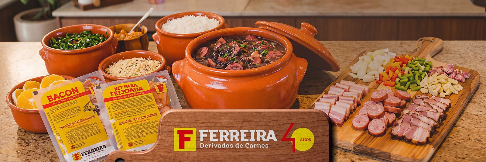 Mesa com feijoada e os embutidos da Ferreira