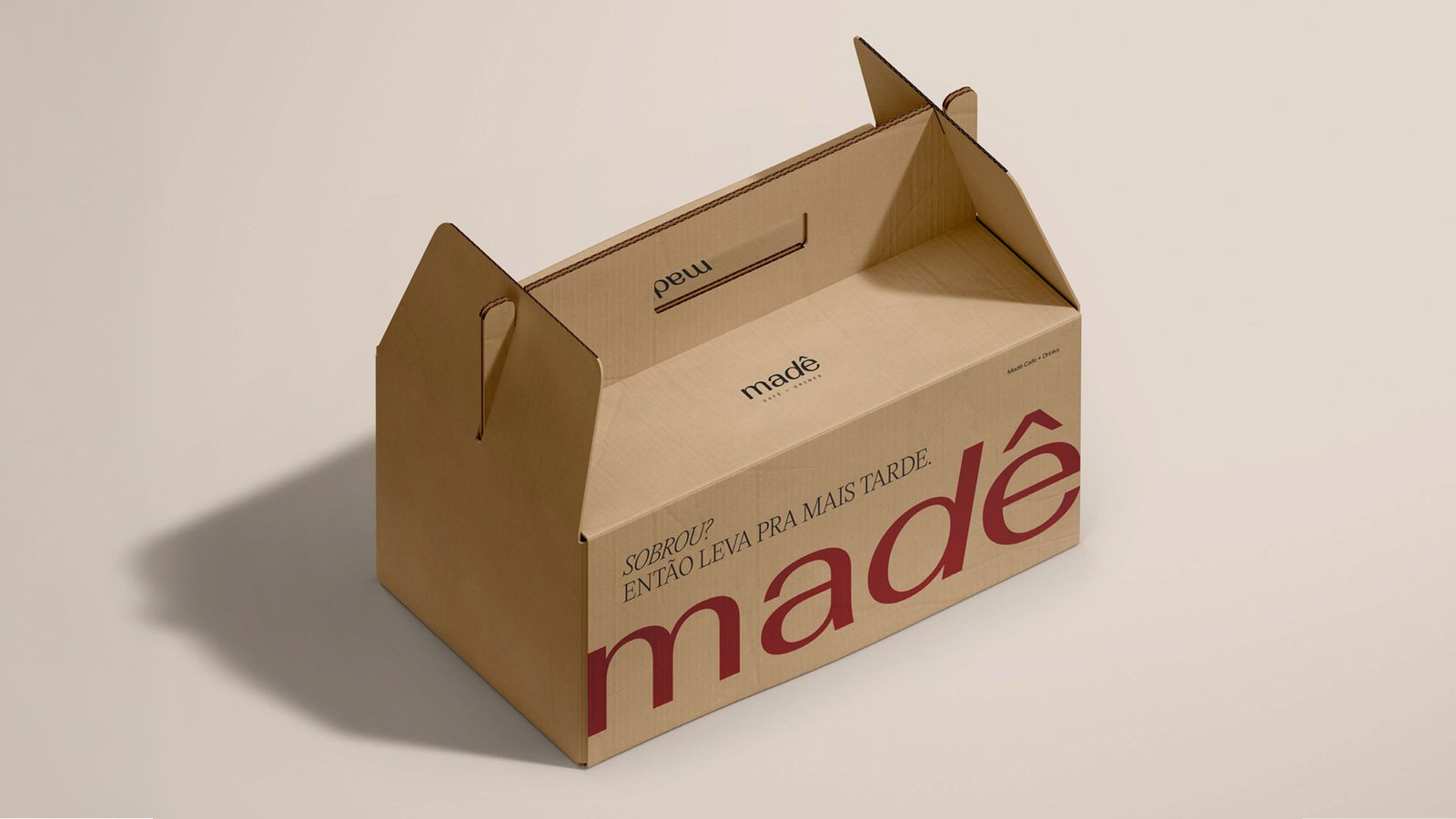 Embalagem para viagem com a marca Madê
